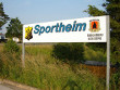 Sportheim-Schild am Parkplatz 2013